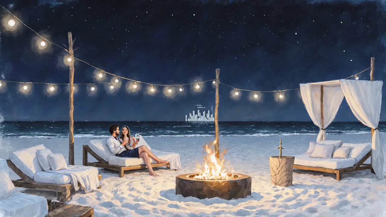 A serene beach club at midnight with fire pits, daybeds, and soft lighting by the Gulf.