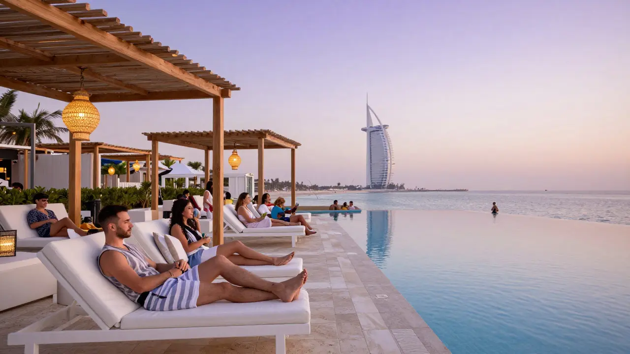 Outdoor beach club pool area in JBR at dusk with palm trees